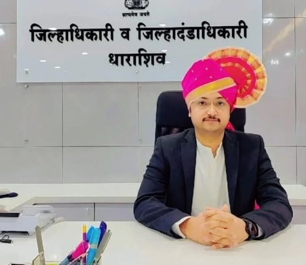 अ