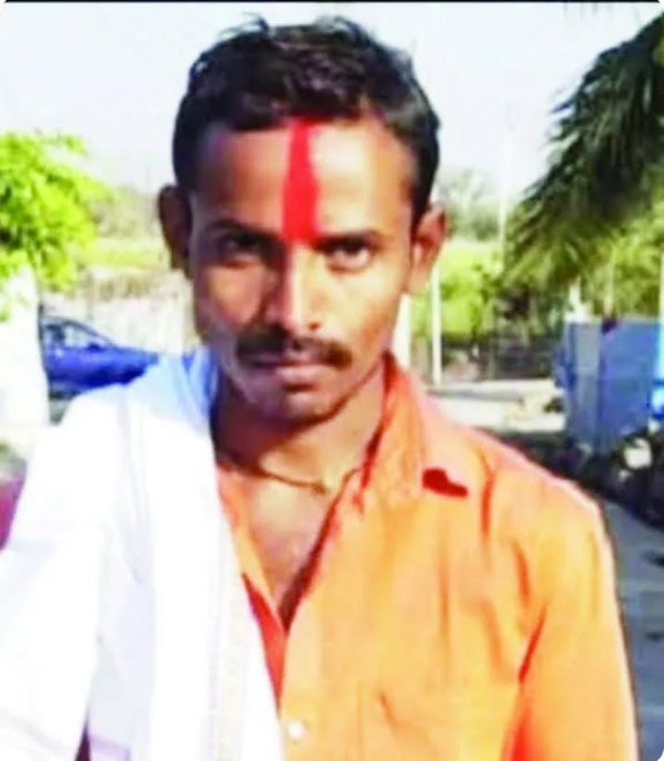 अ