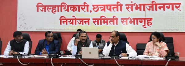 अ