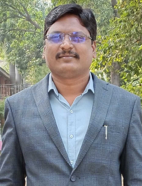 अ