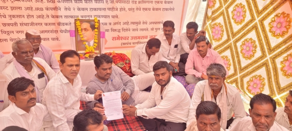 अ