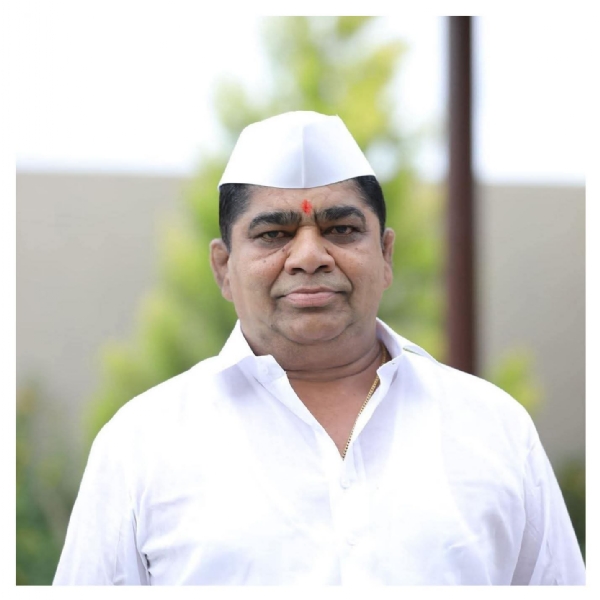 अ