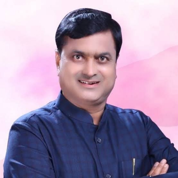 अ