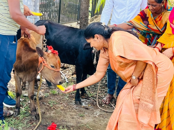 अ