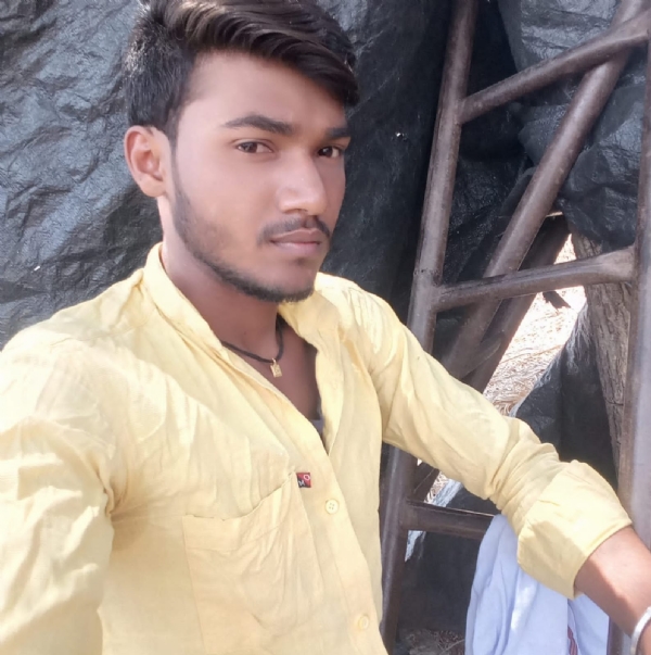 अ