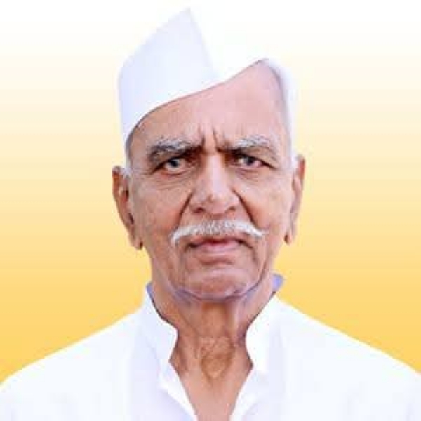 अ