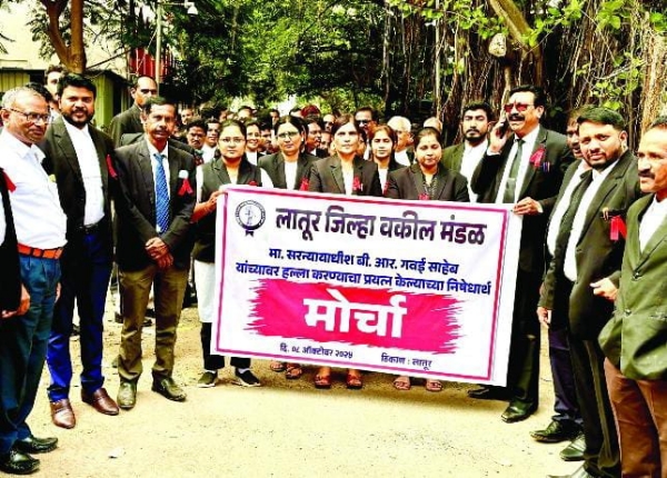 अ