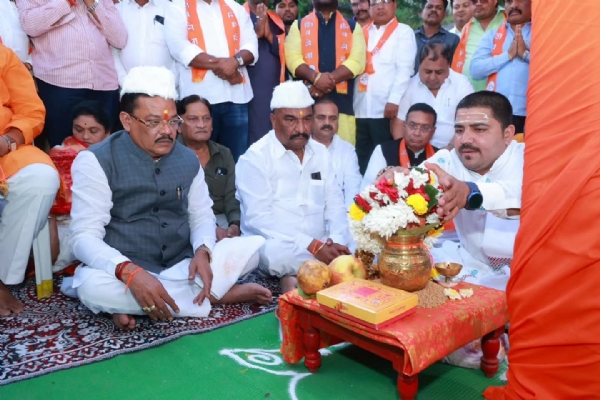 अ