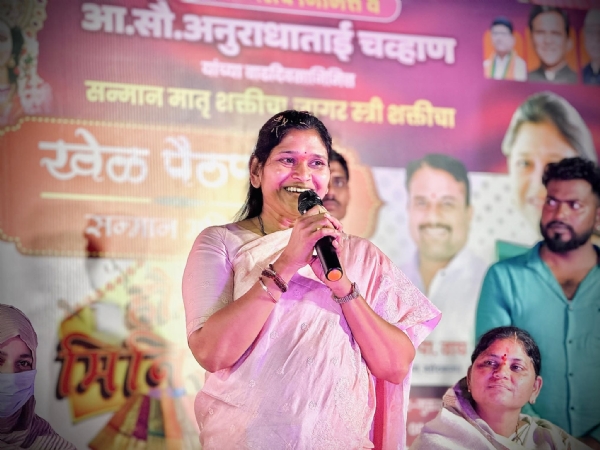अ