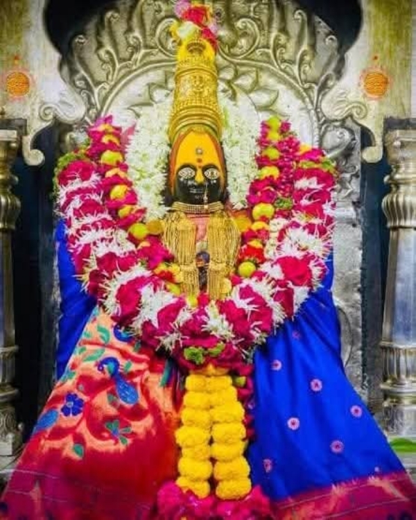 अ