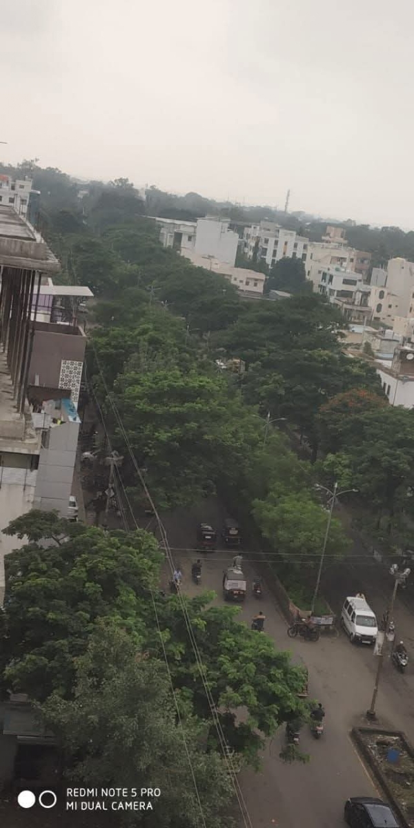 अ