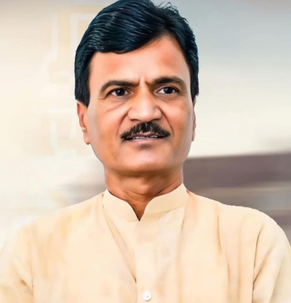अ