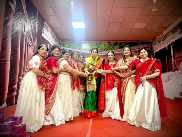 अ