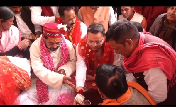 Chief Minister Pushkar Singh Dhami performing prayers