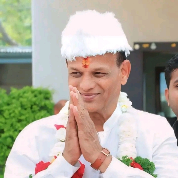 अ