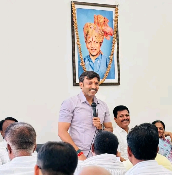 अ
