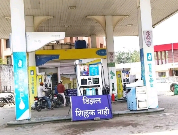 अ