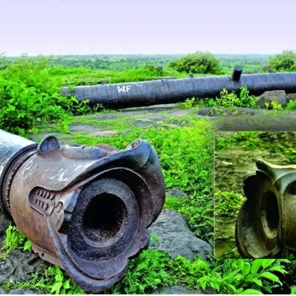 अ