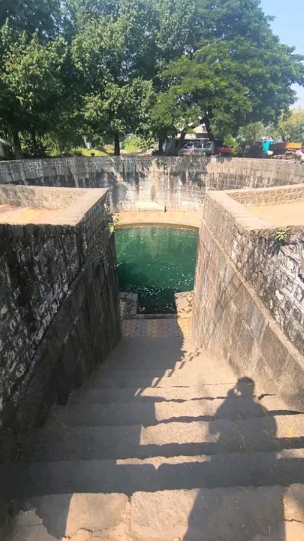 अ