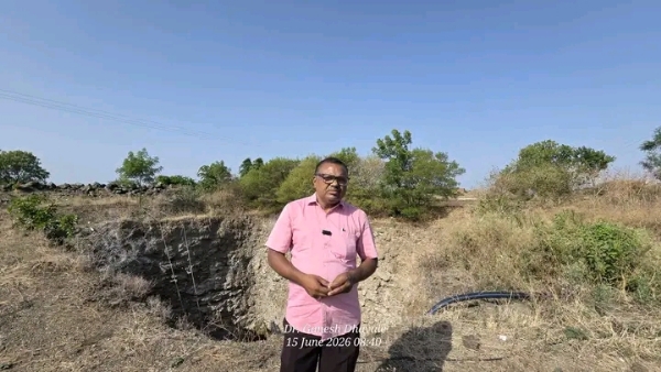 अ