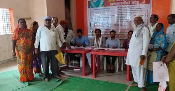 अ