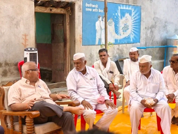 अ