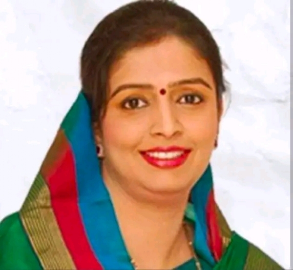 अ
