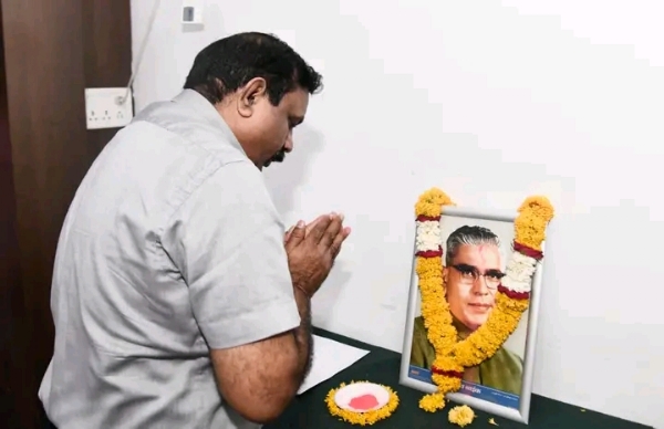 अ