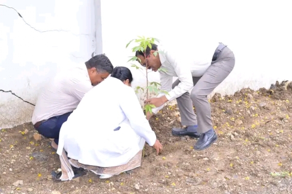 अ