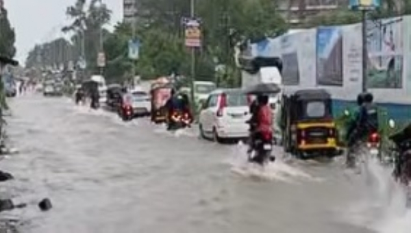 Water inundates Mumbai-Pune Highway; motorists urged to exercise caution. Water inundates Mumbai-Pune Highway; motorists urged to exercise caution.