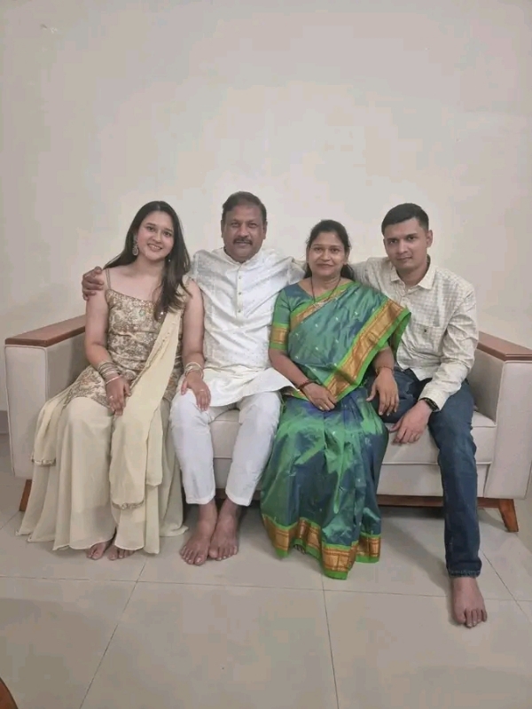 अ