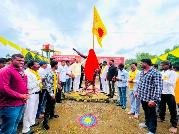 अ