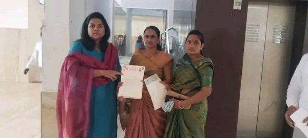 अ