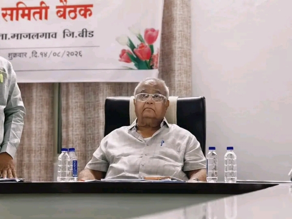 अ