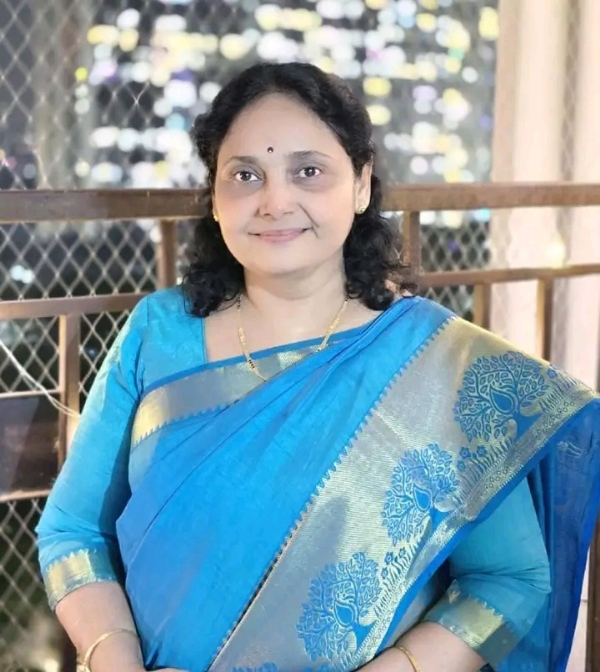 अ