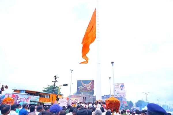 अ