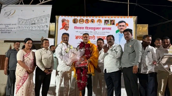 अ