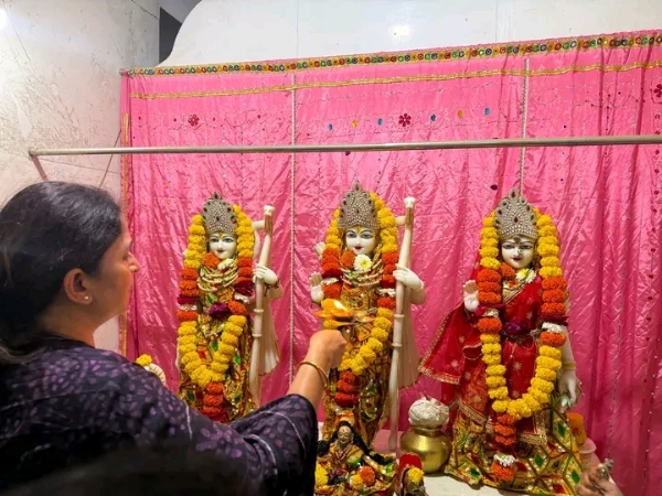 अ