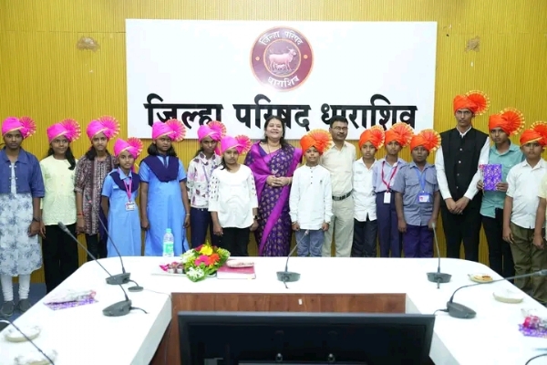 अ