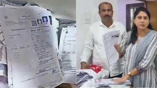 bjp official kharghar carrying 3400 illegal sir forms 5 blo suspended taking bjp official kharghar carrying 3400 illegal sir forms 5 blo suspended taking