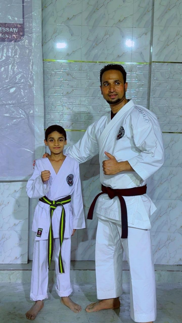 Fateh tops among 500 students; earns black belt at age nine.