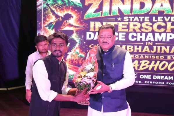 अ