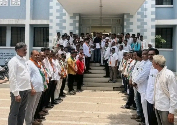 अ