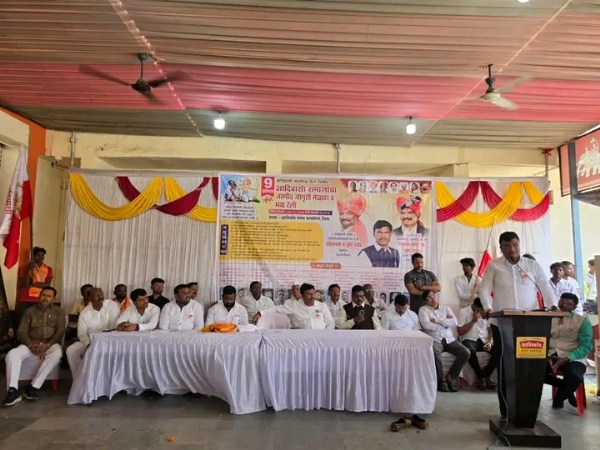 अ