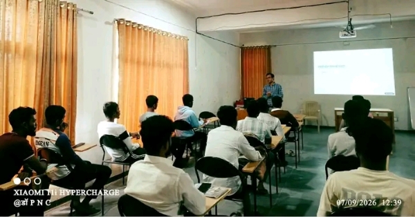 अ