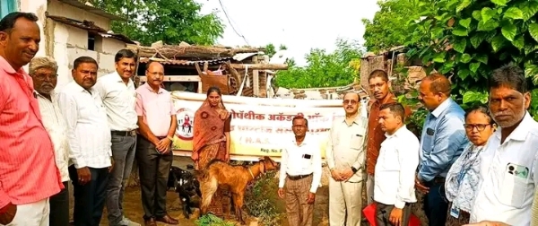 अ