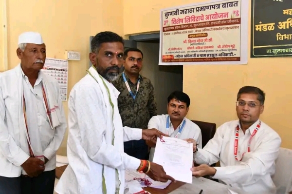 अ