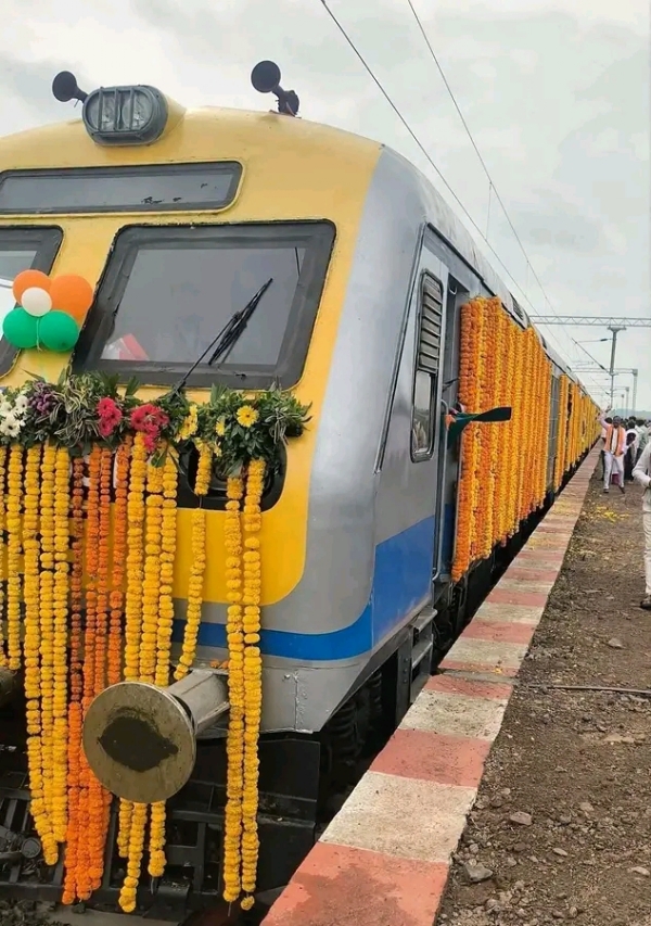 अ
