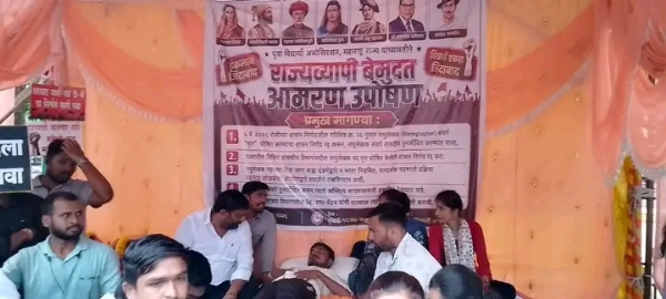 अ