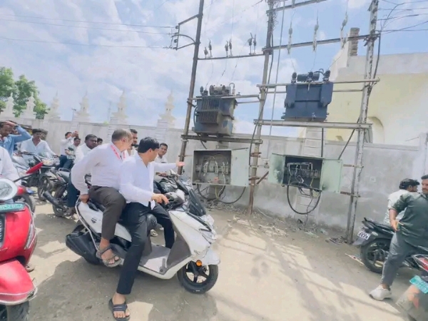 अ